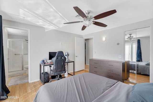 1511 W Mesquite St, Chandler, AZ 85224 - bedroom with light wood finished floors, ensuite bath, a ceiling fan, baseboards, and visible vents