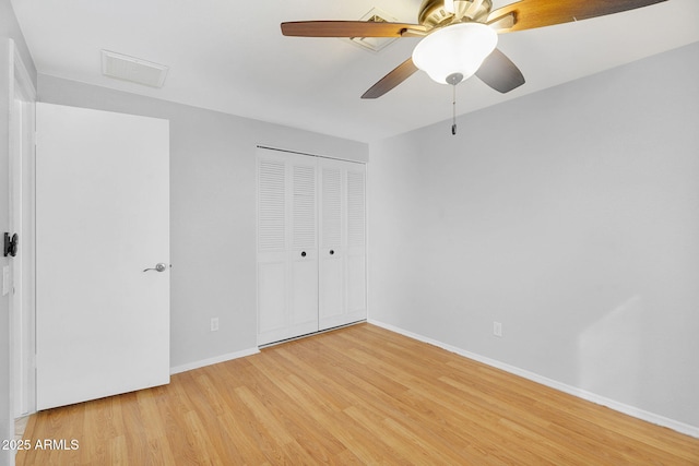 1511 W Mesquite St, Chandler, AZ 85224 - unfurnished bedroom featuring baseboards, visible vents, light wood-style flooring, and a closet