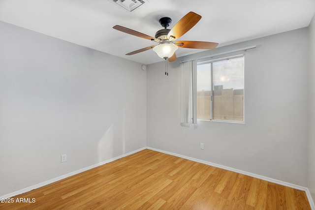 1511 W Mesquite St, Chandler, AZ 85224 - spare room with ceiling fan, baseboards, visible vents, and wood finished floors