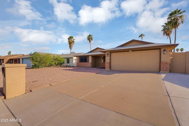 1511 W Mesquite St, Chandler, AZ 85224 - ranch-style house with concrete driveway, brick siding, fence, and a garage