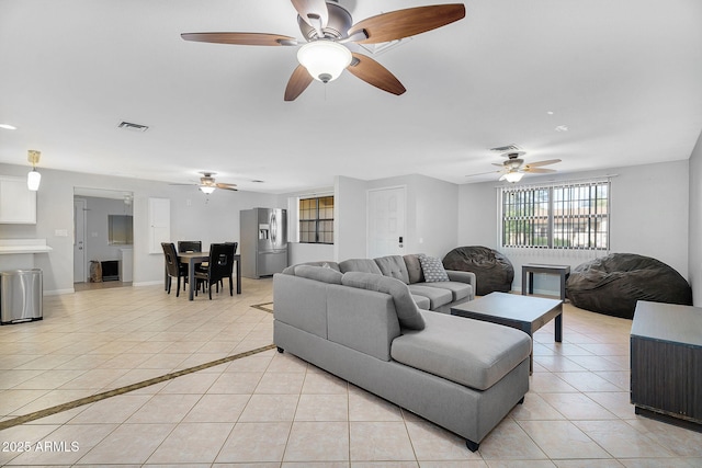 1511 W Mesquite St, Chandler, AZ 85224 - living area featuring ceiling fan, visible vents, and light tile patterned floors