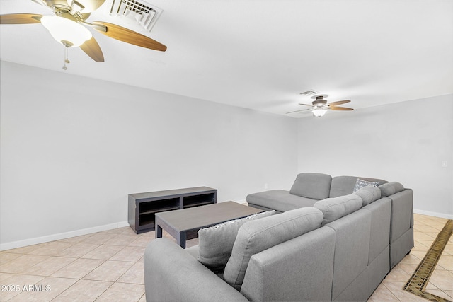 1511 W Mesquite St, Chandler, AZ 85224 - living area featuring light tile patterned flooring, ceiling fan, visible vents, and baseboards