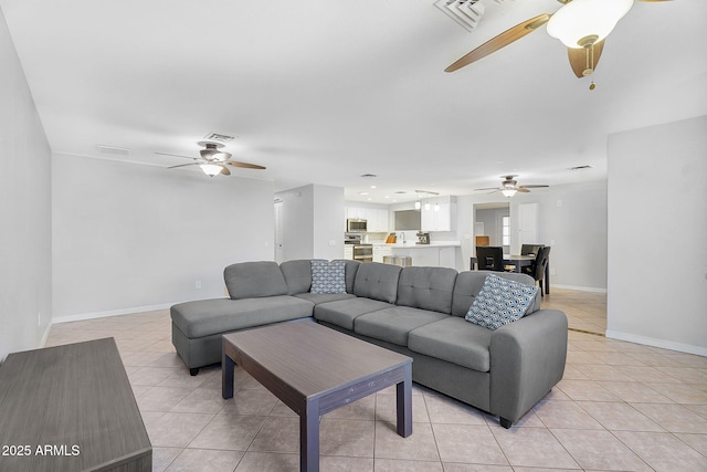 1511 W Mesquite St, Chandler, AZ 85224 - living room with light tile patterned floors, a ceiling fan, and visible vents