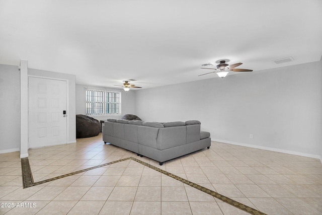 1511 W Mesquite St, Chandler, AZ 85224 - living room with light tile patterned floors, ceiling fan, visible vents, and baseboards