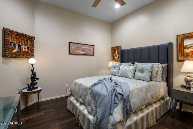 bedroom featuring dark wood-type flooring and ceiling fan