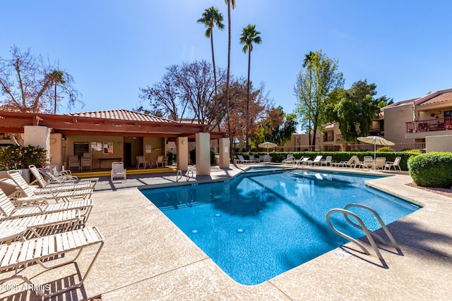 pool with a patio area