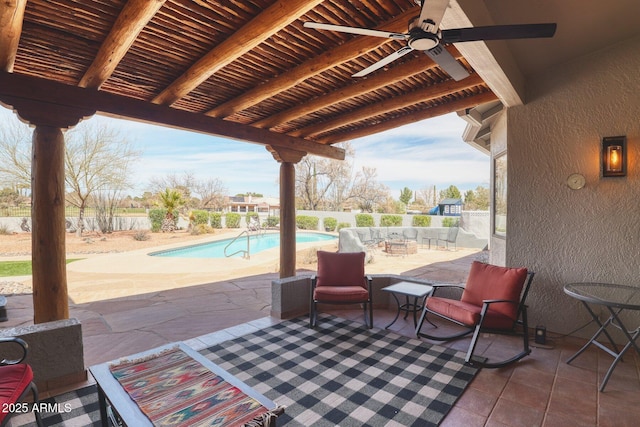 view of patio with fence and a fenced in pool