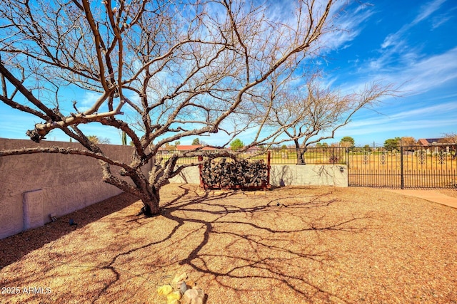 view of yard with fence