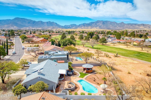 bird's eye view with a residential view and a mountain view