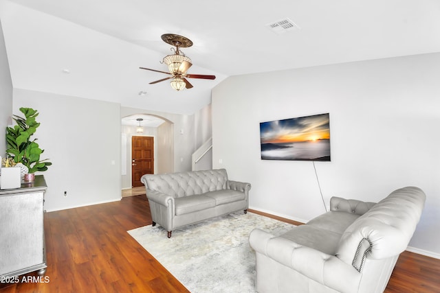 8781 S Mill Ave, Tempe, AZ 85284 - living area featuring visible vents, ceiling fan, vaulted ceiling, wood finished floors, and arched walkways