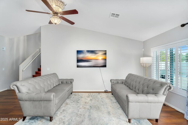 8781 S Mill Ave, Tempe, AZ 85284 - living area with stairway, wood finished floors, visible vents, ceiling fan, and vaulted ceiling