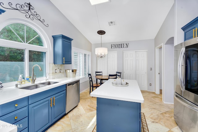 8781 S Mill Ave, Tempe, AZ 85284 - kitchen with visible vents, a kitchen island, stainless steel appliances, blue cabinets, and a sink