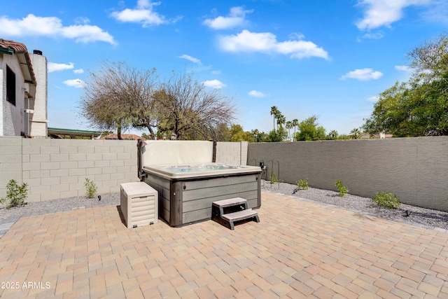 8781 S Mill Ave, Tempe, AZ 85284 - view of patio with a fenced backyard and a hot tub