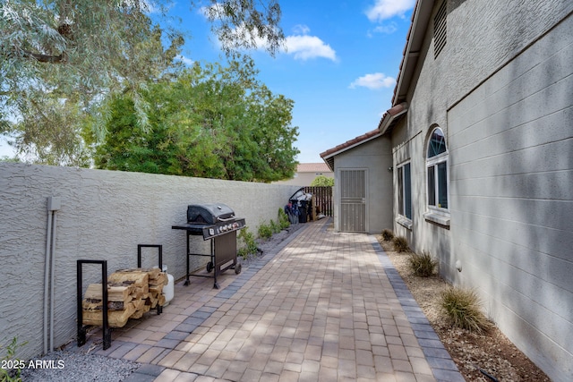 8781 S Mill Ave, Tempe, AZ 85284 - view of patio with grilling area and a fenced backyard