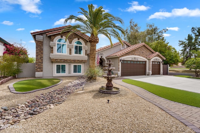 8781 S Mill Ave, Tempe, AZ 85284 - view of front facade featuring stucco siding, driveway, a tile roof, and a garage
