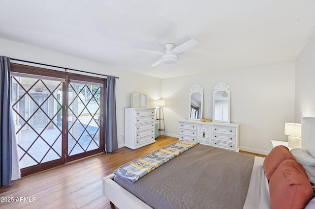 bedroom with baseboards, ceiling fan, and light wood finished floors