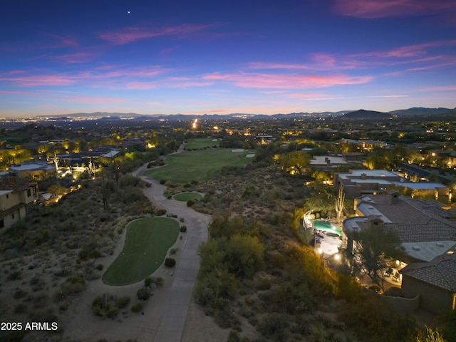 aerial view at dusk with a mountain view