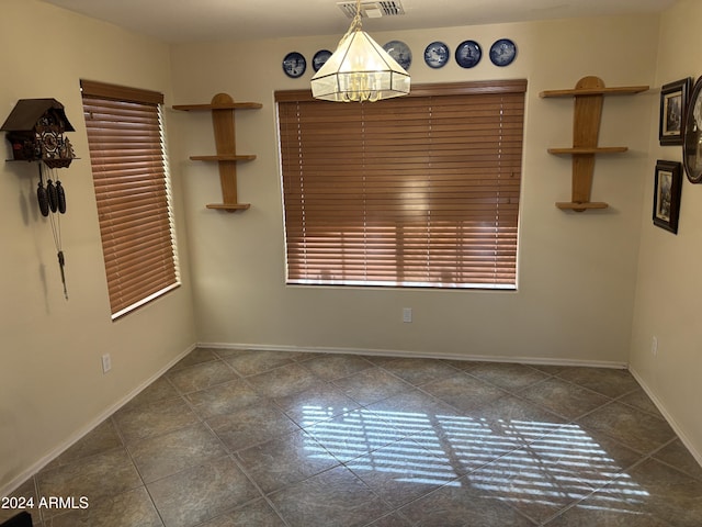 view of tiled spare room