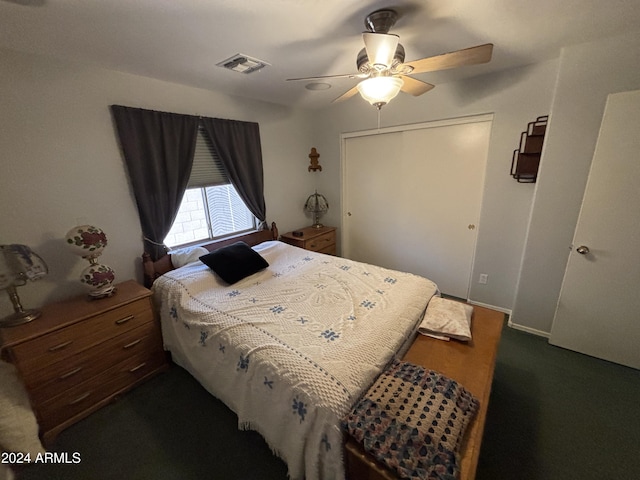 bedroom featuring ceiling fan and a closet