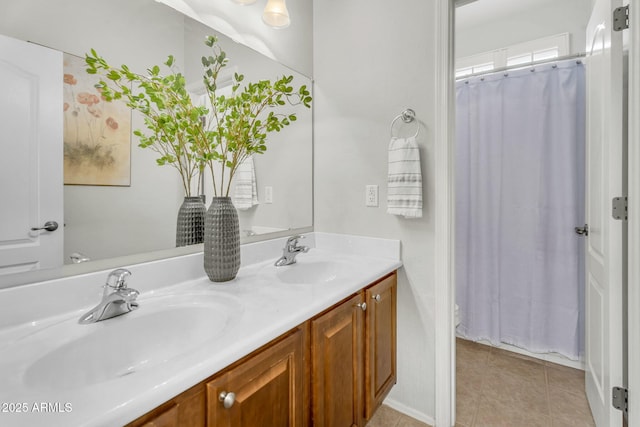 3859 N El Sereno St, Mesa, AZ 85207 - full bath with double vanity, tile patterned floors, and a shower with shower curtain