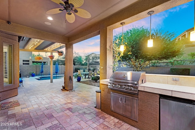 3859 N El Sereno St, Mesa, AZ 85207 - fenced backyard featuring a patio, outdoor dining area, and a ceiling fan