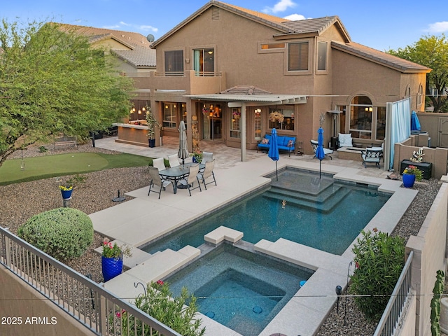 3859 N El Sereno St, Mesa, AZ 85207 - view of pool with a putting green, a patio, a pool with connected hot tub, and a fenced backyard