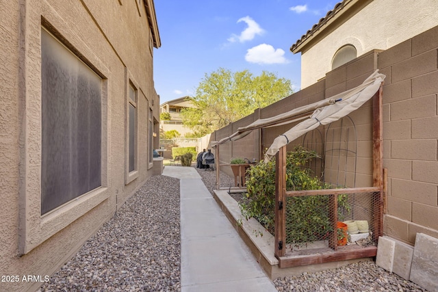 3859 N El Sereno St, Mesa, AZ 85207 - view of home's exterior featuring a fenced backyard and stucco siding