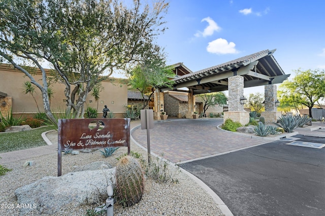 3859 N El Sereno St, Mesa, AZ 85207 - view of front facade featuring stone siding and a tile roof