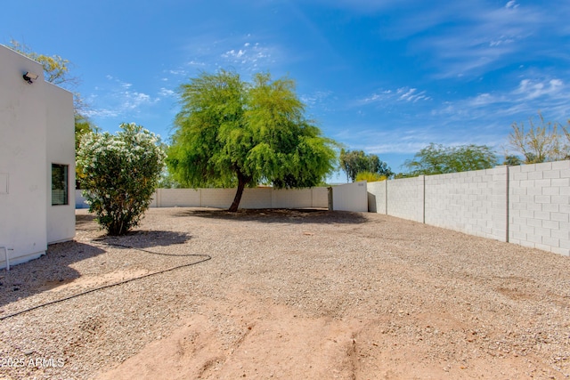 view of yard featuring a fenced backyard