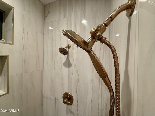 details with a tile shower