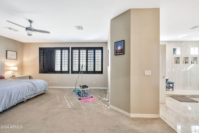 carpeted bedroom with ceiling fan