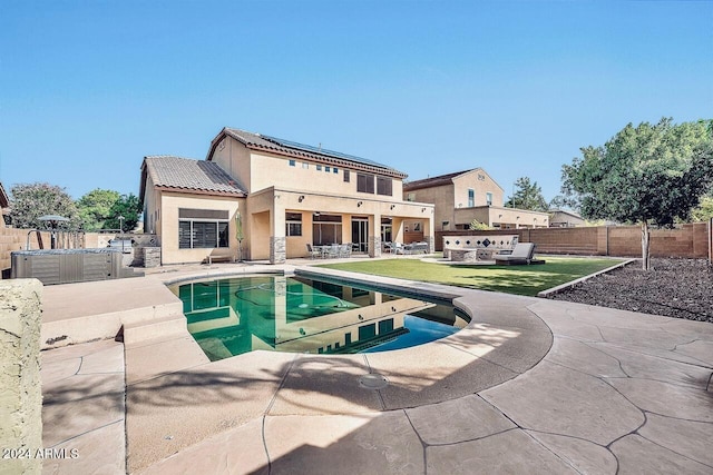 view of swimming pool featuring a yard, a patio area, and outdoor lounge area