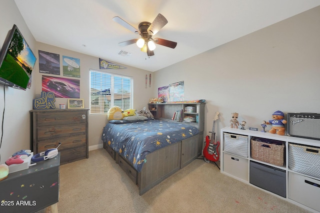 bedroom featuring light colored carpet, visible vents, ceiling fan, and baseboards