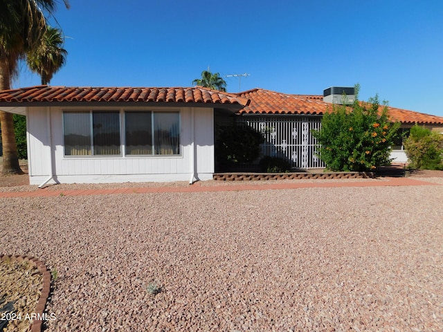 view of front of house featuring a tile roof