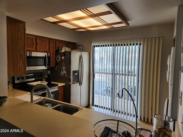 kitchen featuring stainless steel appliances and sink