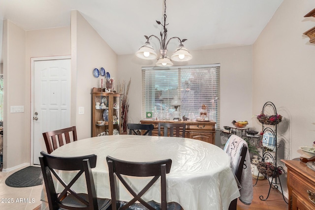 dining space with a chandelier