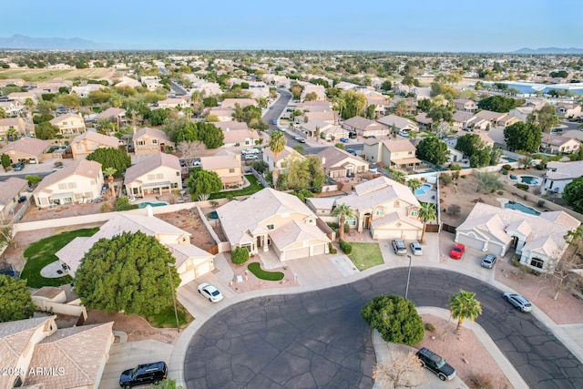 birds eye view of property with a residential view