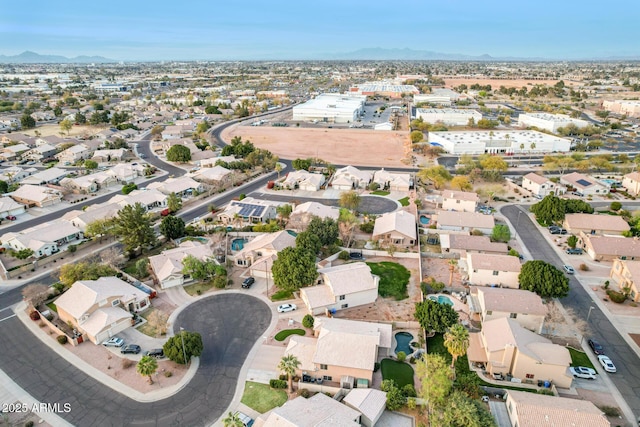 drone / aerial view with a residential view and a mountain view