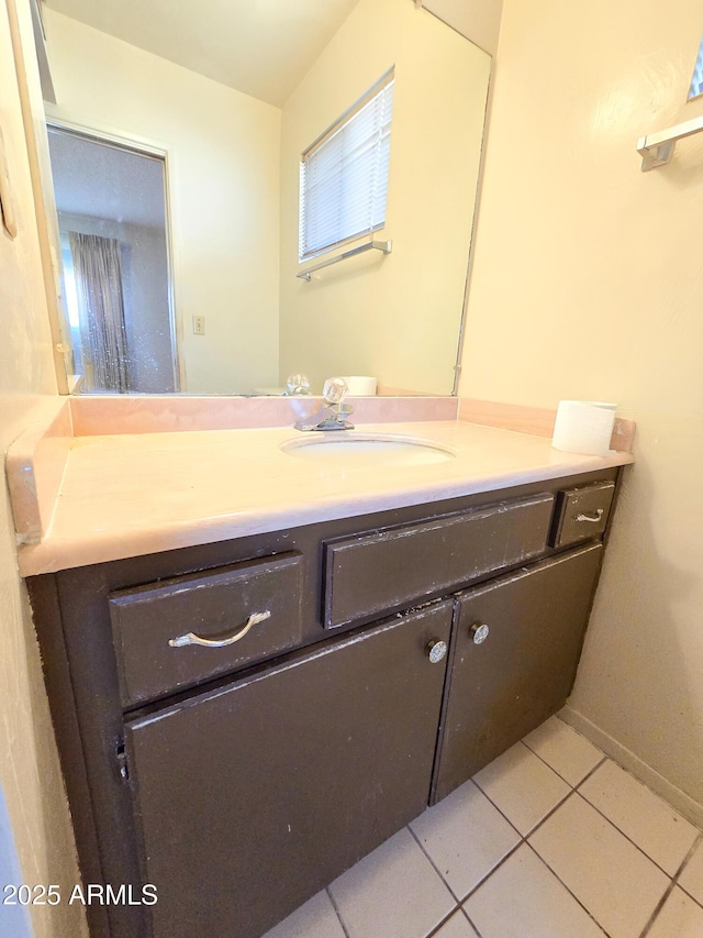 bathroom featuring vanity and tile patterned flooring