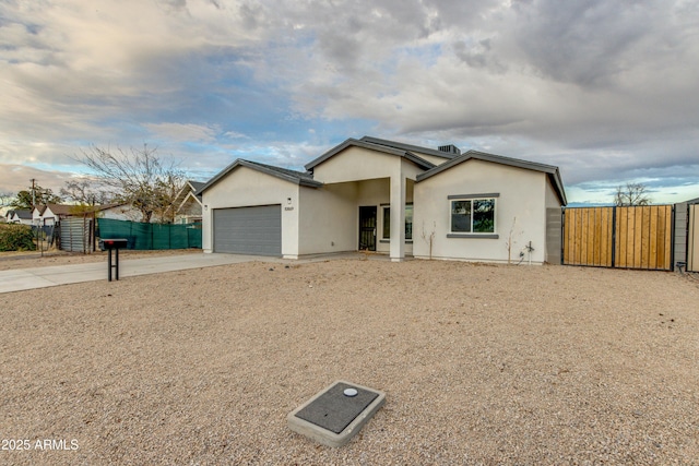 single story home with a garage