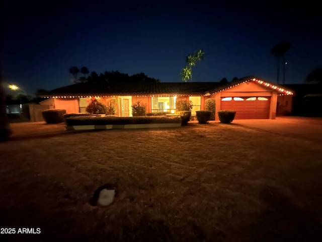 view of front of home featuring a garage