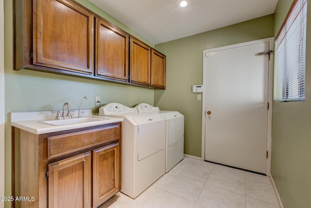 4856 E Cheryl Dr, Paradise Valley, AZ 85253 - washroom with cabinet space, independent washer and dryer, and light tile patterned flooring