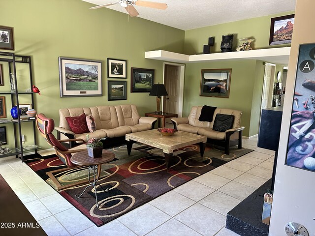 4856 E Cheryl Dr, Paradise Valley, AZ 85253 - living room featuring tile patterned flooring, a ceiling fan, and a textured ceiling