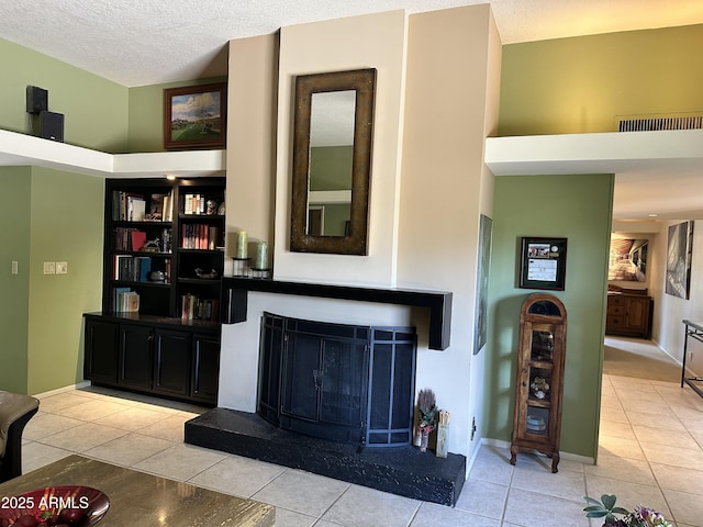 4856 E Cheryl Dr, Paradise Valley, AZ 85253 - living room with tile patterned flooring, a fireplace with raised hearth, and a textured ceiling