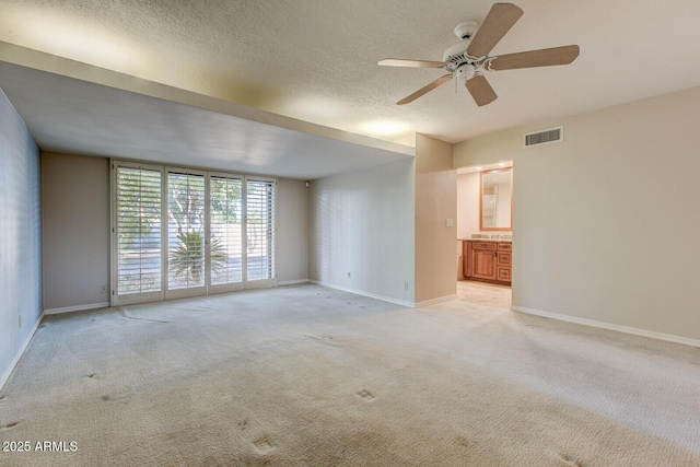 4856 E Cheryl Dr, Paradise Valley, AZ 85253 - spare room featuring a ceiling fan and light colored carpet