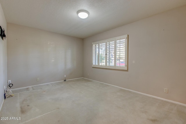 4856 E Cheryl Dr, Paradise Valley, AZ 85253 - carpeted empty room with baseboards and a textured ceiling