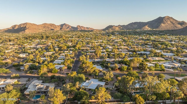 4856 E Cheryl Dr, Paradise Valley, AZ 85253 - aerial view of property and surrounding area with a mountain backdrop and nearby suburban area