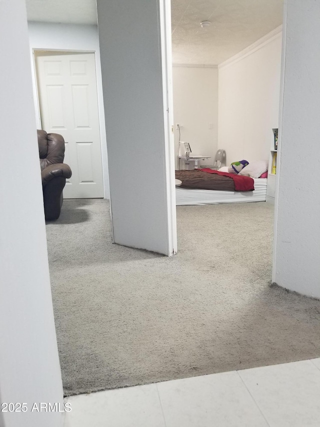 1226 N Mckinley Ave, Ajo, AZ 85321 - hallway featuring carpet and ornamental molding