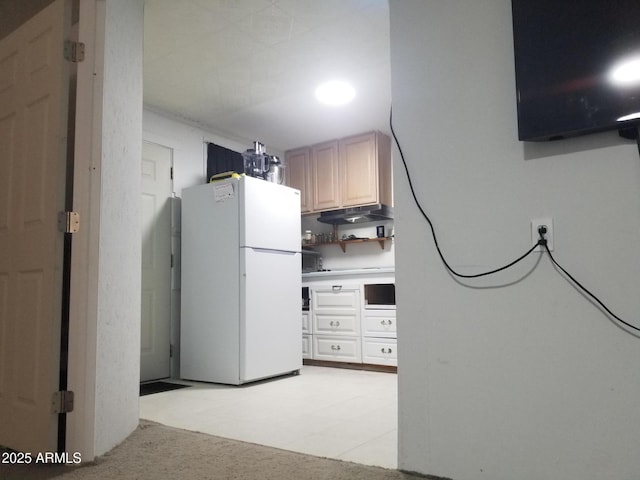 1226 N Mckinley Ave, Ajo, AZ 85321 - kitchen with freestanding refrigerator, light floors, and light countertops