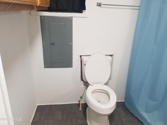 1226 N Mckinley Ave, Ajo, AZ 85321 - bathroom with electric panel and a shower with shower curtain